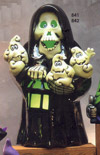 Caped Skeleton with Ghosts
